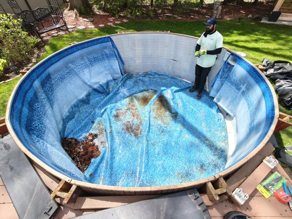 Vinyl pool liner replacement in progress